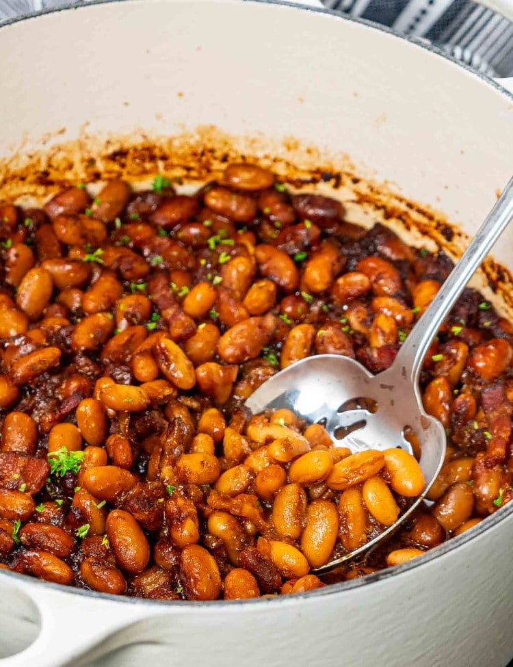 freshly made baked beans in a dutch oven.