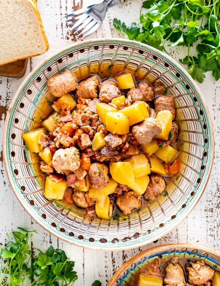 a serving of dublin coddle in a plate.