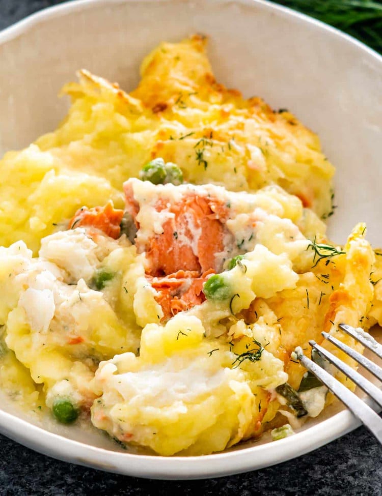 a serving of fish pie in a white bowl.