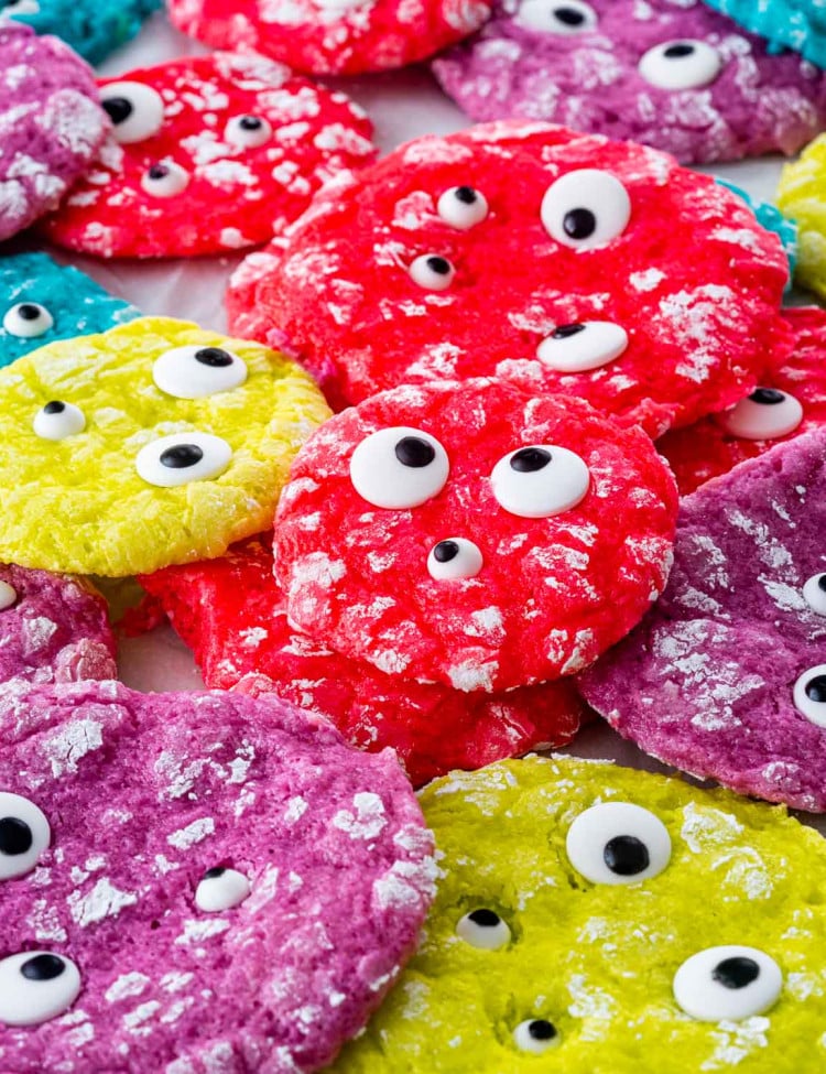 freshly baked monster cookies of all different neon colors with eyeball candy.