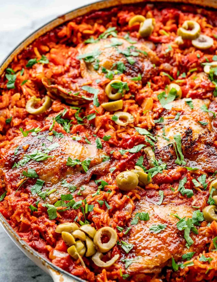 spanish chicken and rice in a pot fresh out of the oven.