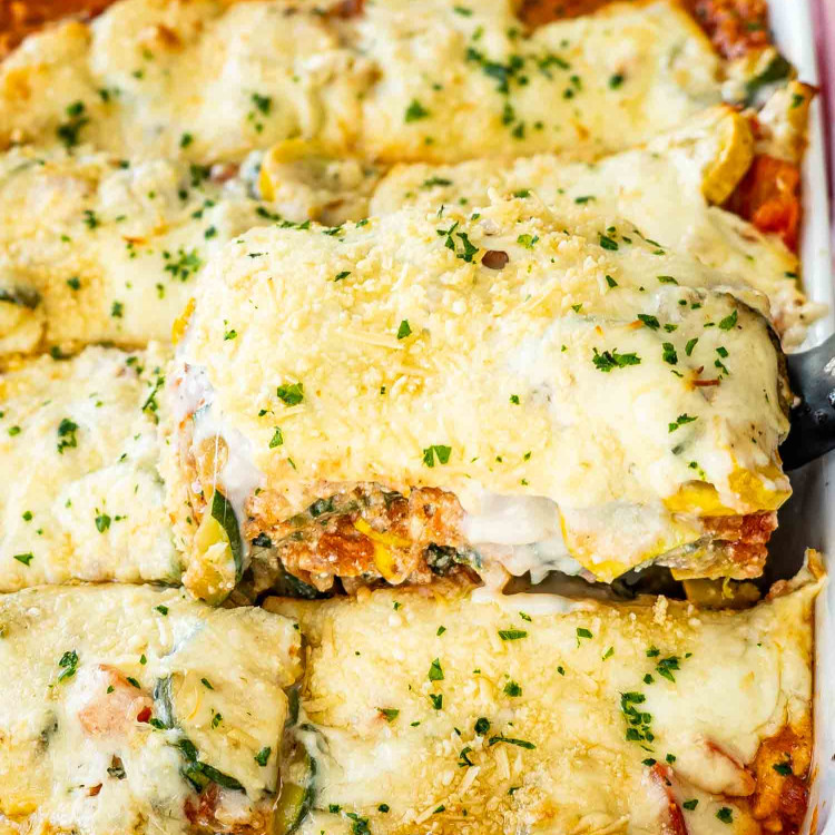 vegetable lasagna in a casserole dish fresh out of the oven.